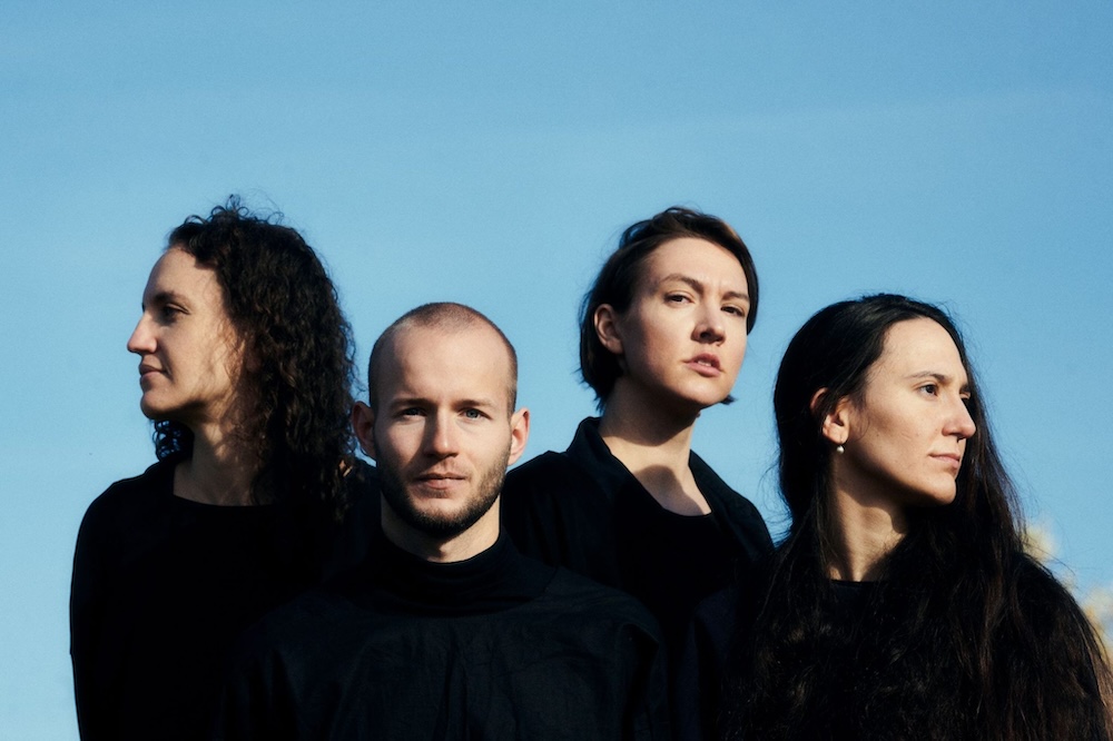 between feathers ensemble